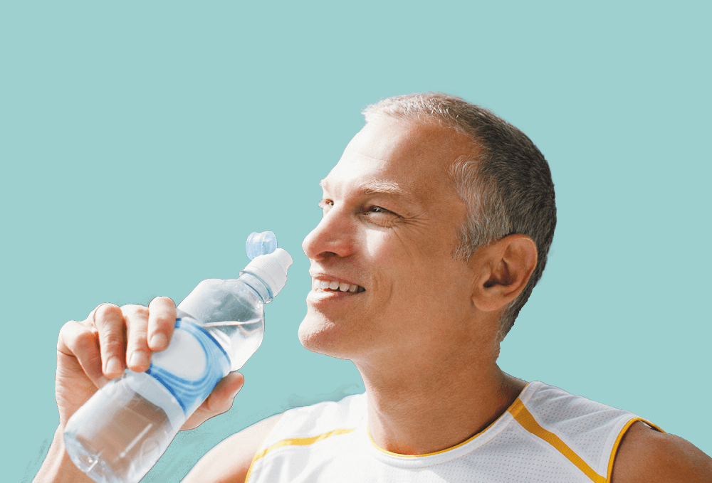 Man drinking water to stay hydrated