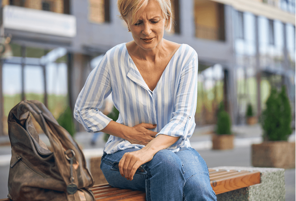 Woman with a UTI and stomach pains