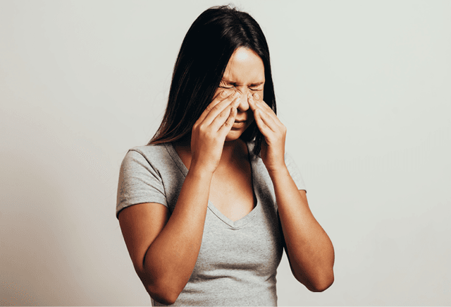 Woman with sinusitis